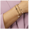 My Bendel Armband, edelstaal verguld met zwart/witte glasparels (lengte: 15,5-20,5cm.) - 23130