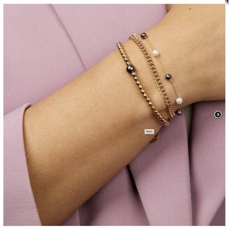My Bendel Armband, edelstaal verguld met zwart/witte glasparels (lengte: 15,5-20,5cm.) - 23130