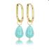 My Bendel Oorringen, edelstaal verguld met Blue Howlite (12x16mm.) - 23406